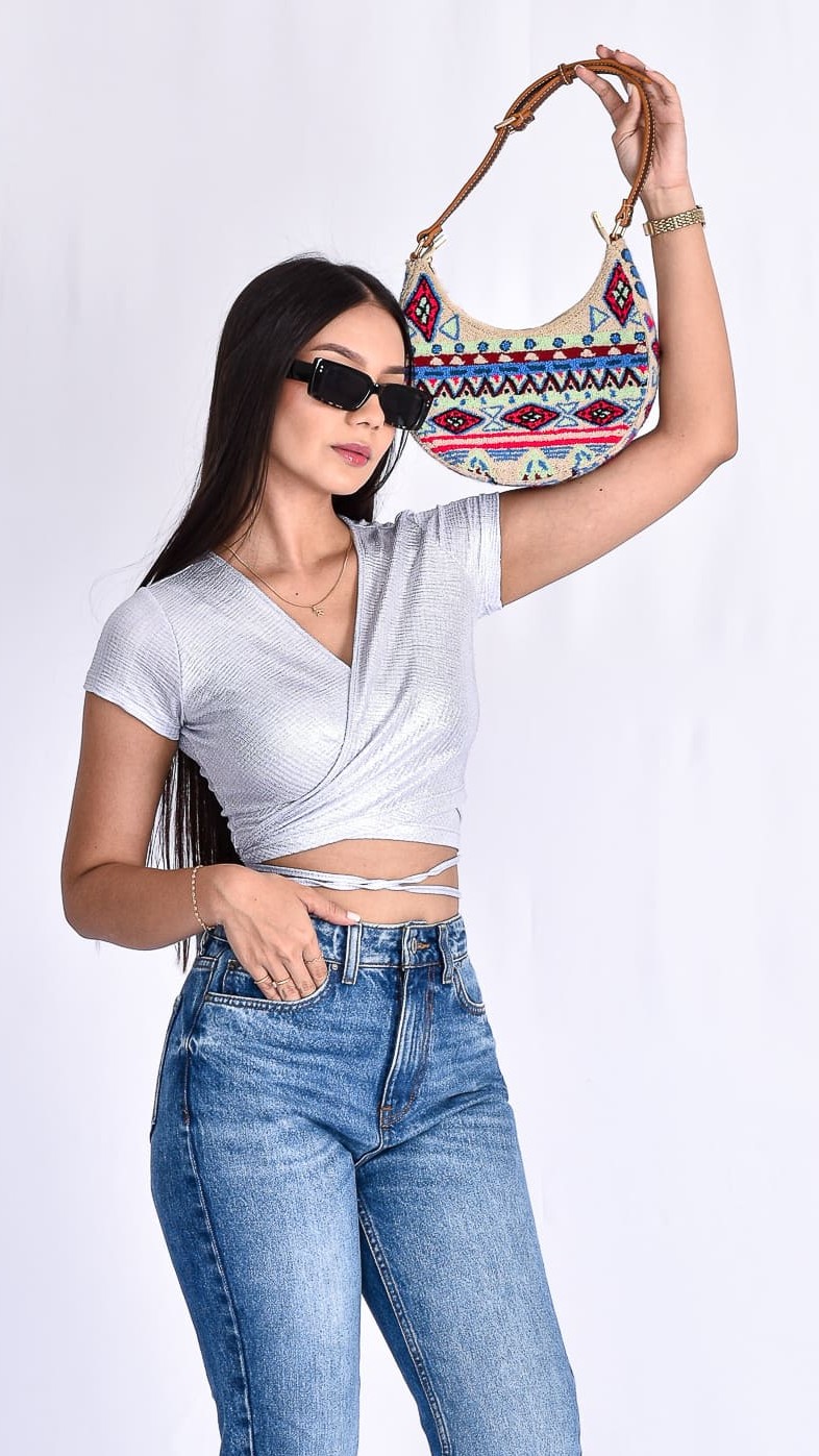 Selena Crescent Wayuu Bag, handmade Colombian shoulder bag with beige and blue geometric patterns, authentic handwoven bag by Wayuu artisans.