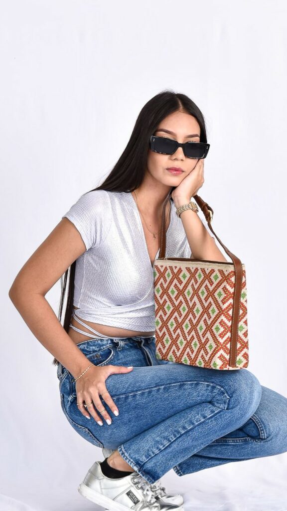 Bella Christmas Wayuu Bag, handmade Colombian shoulder bag with red, green, and beige geometric patterns inspired by Christmas