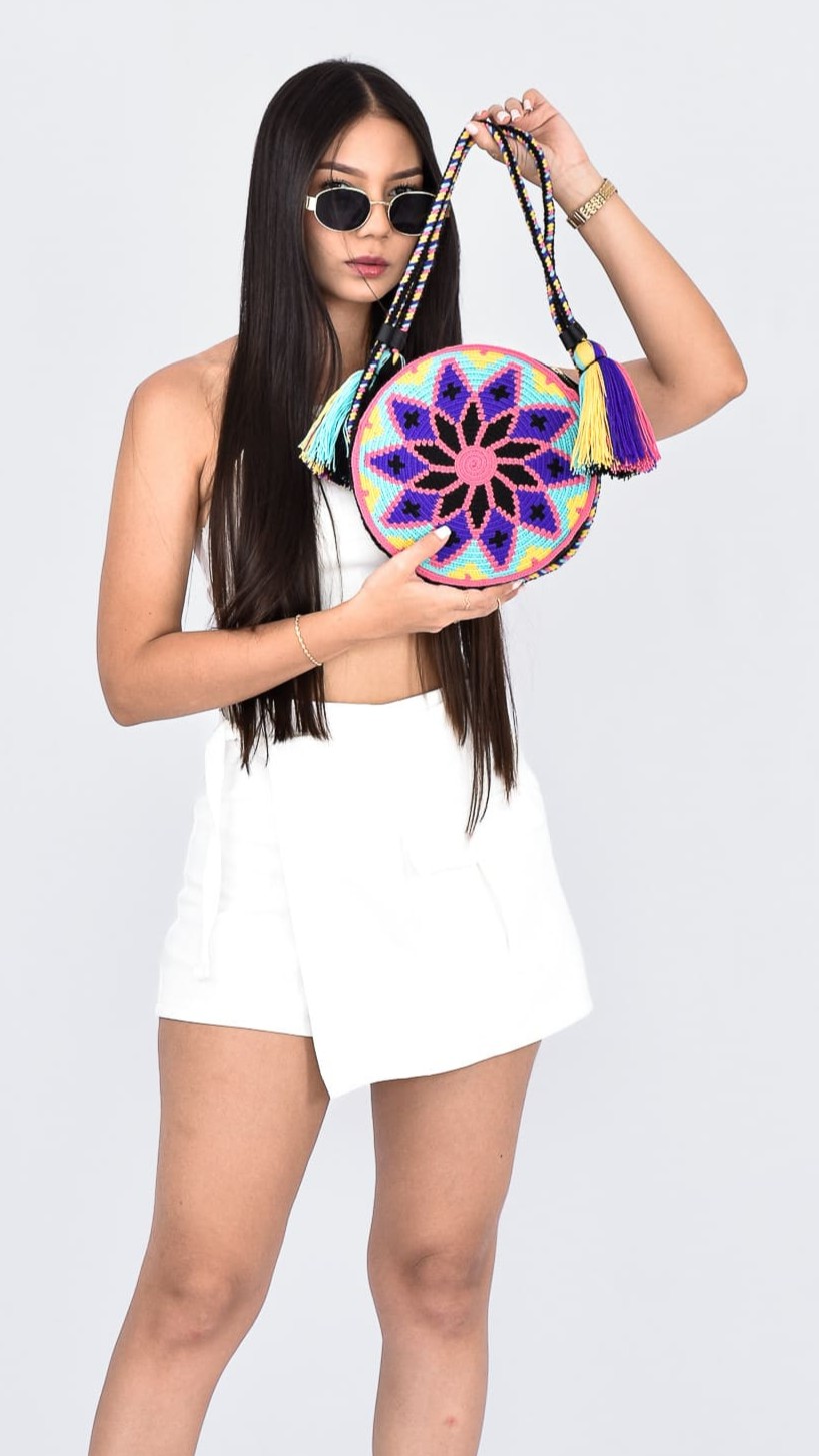 Giulia Wayuu Round Bag, handcrafted Colombian bag with purple and pink geometric motifs, handmade crochet shoulder bag.